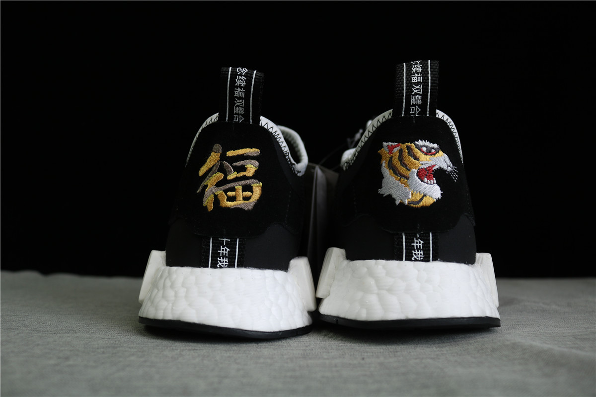 Invincible X Nbhd X Addias Consortium NMD R1